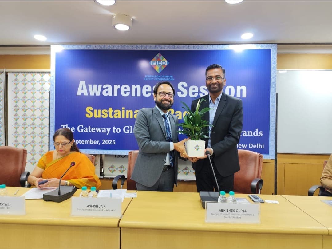 Abhishek Kumar Gupta being presented with a plant at the FIEO awareness session on sustainable packaging
